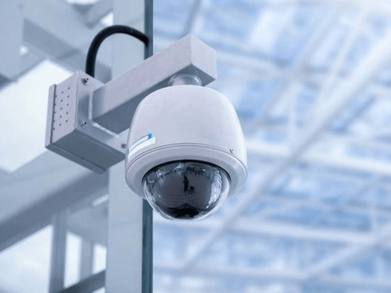Dome camera mounted in a commercial lobby