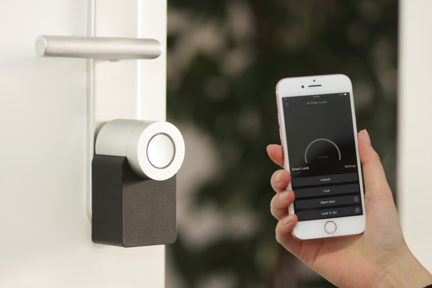 Smart lock on a door with a phone nearby